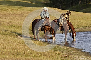 Horseback Riders at Water Hole