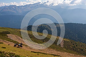 Horseback riding in the Caucasian mountains
