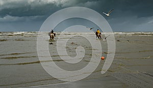 Horseback shrimp fishermen