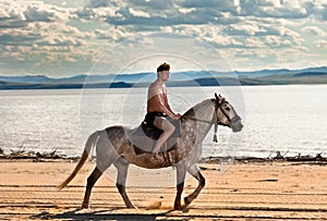 Horseman on the beach