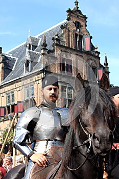 Horseman dressed in suit of armour