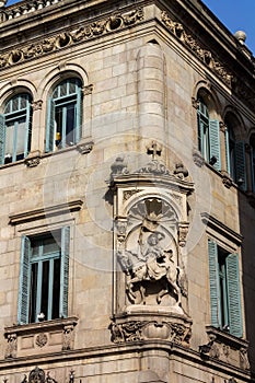 Horseman equestrian on the facade of a historical building in Ciutat Vella, Barcelona, Spain
