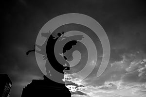 Horseman on a Pegasus statue, a monochrome shot