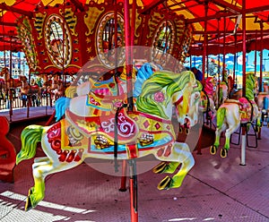 Horses on a Coney Island carousel in Luna Park at historic Coney Island Boardwalk in Brooklyn