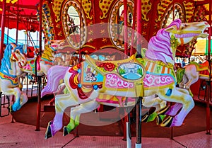 Horses on a Coney Island carousel in Luna Park at historic Coney Island Boardwalk in Brooklyn