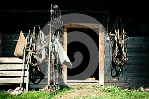 Horses harness hanging on a barn