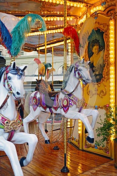 Horses on an old-style carousel in Florence, Italy