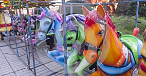 Horses out of merry-go-round placed on line