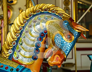 Horses on a traditional fairground B&B carousel at historic Coney Island Boardwalk in Brooklyn photo