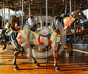 Horses on a traditional fairground carousel