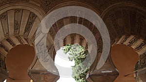 Horseshoe arches in Muslim palace of Nasrid style, Alcazaba, Malaga, Spain