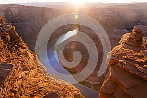 Horseshoe Bend above emerald Colorado River at sunset, Page, Arizona, USA