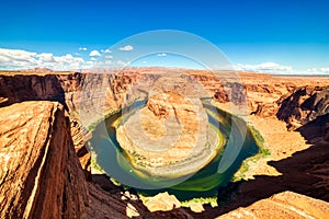 Horseshoe Bend on Colorado River with Bright Blue Sky, Utah