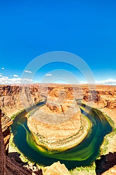 Horseshoe Bend on Colorado River with Bright Blue Sky, Utah