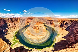 Horseshoe Bend on Colorado River with Bright Blue Sky, Utah