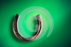 Horseshoe on a bright green background