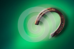 Horseshoe on a bright green background