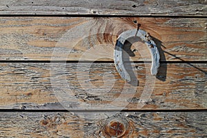 Horseshoe on nail on door