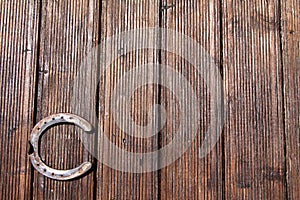 Horseshoe on table background photo