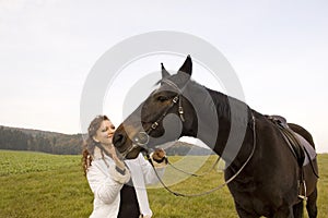 Horsewoman and horse.