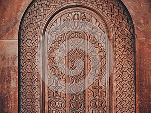 Horzontal view of handmade ornate wooden gate texture
