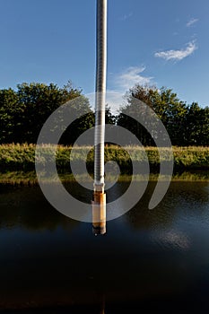 Hose pipe, Canal Leuven Mechelen, Wijgmaal, Belgium