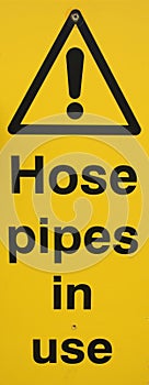 Hose pipe warning sign