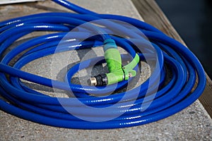 Hose and sprinkler on dock