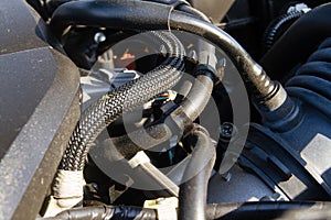 Hoses and cables of car engine