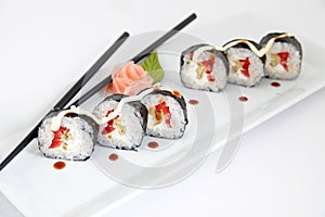 Hosomaki, tempura and red pepper. Traditional japanese sushi rolls