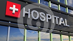 Hospital building sign closeup, with sky