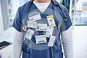 Hospital, doctor and man with name tag, healthcare and promotion with progress, surgeon and nurse. Zoom, person and