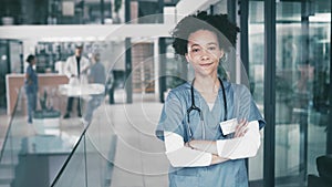 Hospital, face and confident nurse with smile, arms crossed and professional career in healthcare service. Portrait of