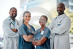 Hospital, happy team and portrait of doctors with crossed arms for medical care, wellness and support. Healthcare