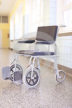 Hospital invalid chair on hospital corridor
