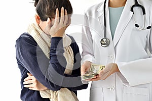Hospital and medical expenses, Woman patient face-palming worried about medical fee charges for disease treatment. photo
