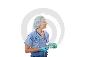 Hospital nurse or pathologist holding blood test tubes and needle