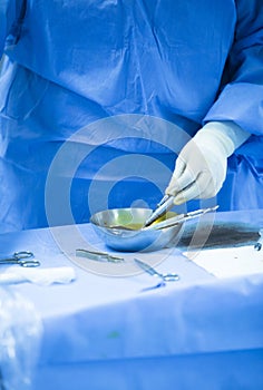 Hospital operating room medical surgeon hands