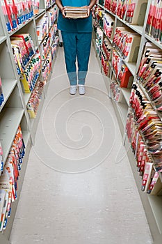 Hospital orderly in archives