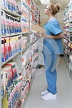 Hospital orderly in archives