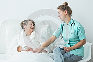 Hospital patient with nurse