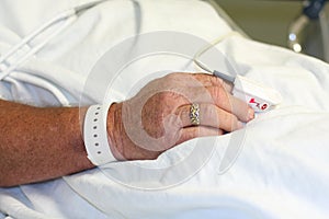 Hospital patient's hand with wrist band