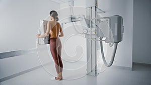 Hospital Radiology Room: Beautiful Multiethnic Woman Standing Topless in the X-Ray Machine. Adult