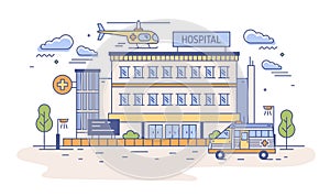 Hospital, rehabilitation center or emergency department building with helicopter landing on top of it and ambulance