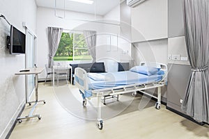 Hospital room with beds and comfortable medical equipped in a mo