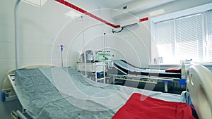 Hospital room with a medical ventilator and nobody inside