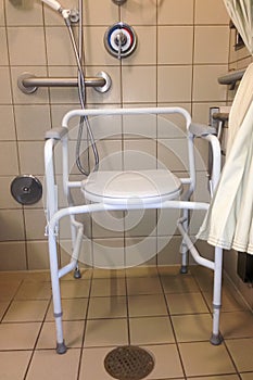 Hospital shower stall with bedside commode photo