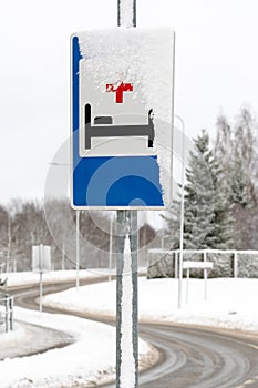 Hospital sign onâ€‹ theâ€‹ roadâ€‹ in winter