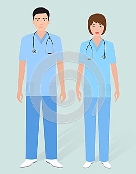 Hospital staff concept. Couple of man orderly and woman nurse.