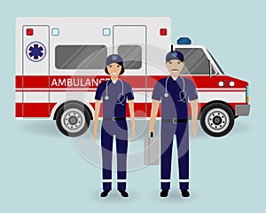 Hospital staff concept. Paramedics ambulance team with ambulance car. Emergency medical serviice employee in uniform.